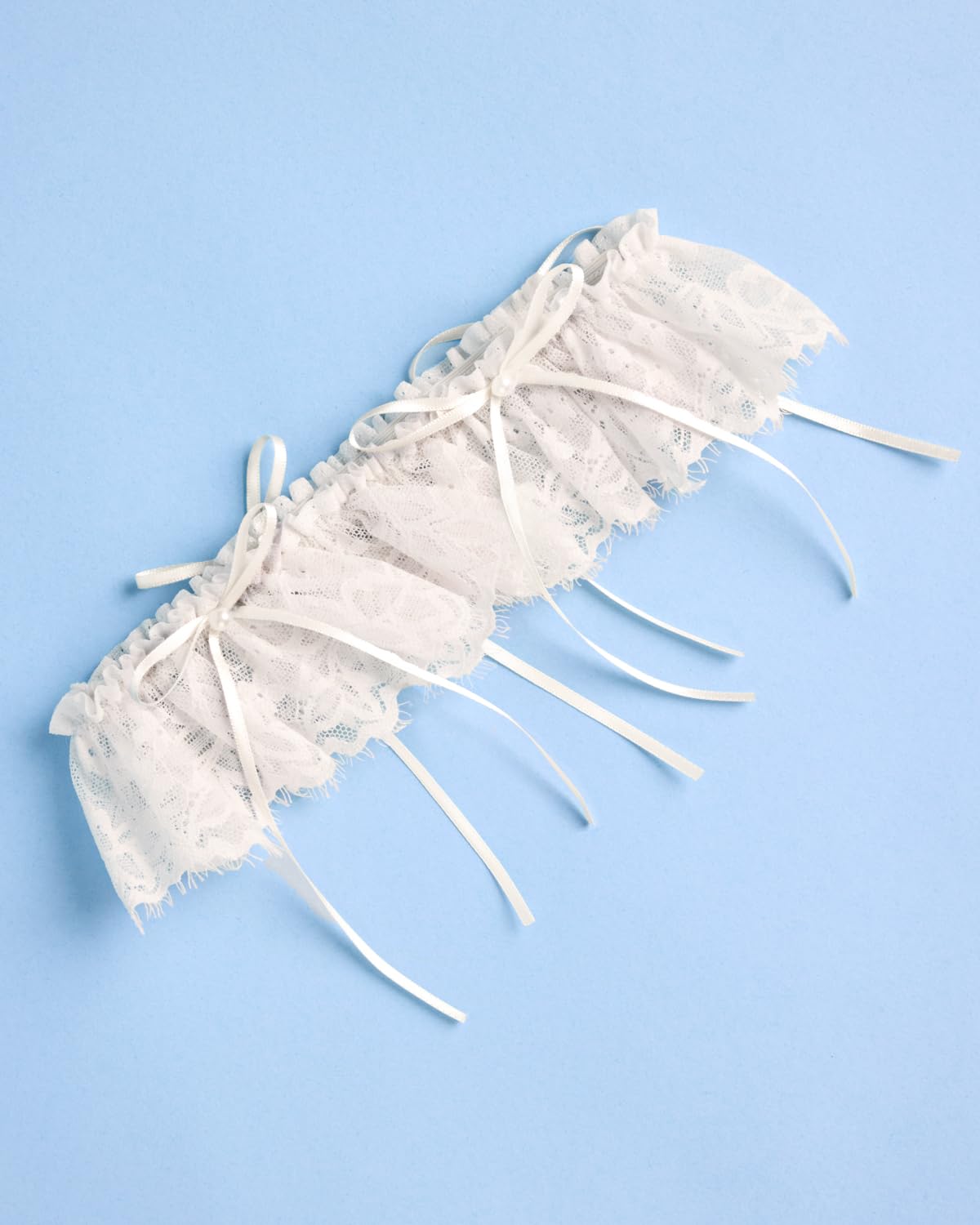 xo, Fetti Lace Bridal Garter with Pearl Bows — image 4